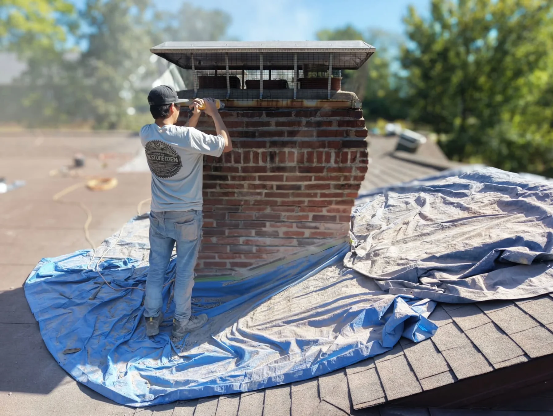 ECI masonry specialist restoring a brick chimney